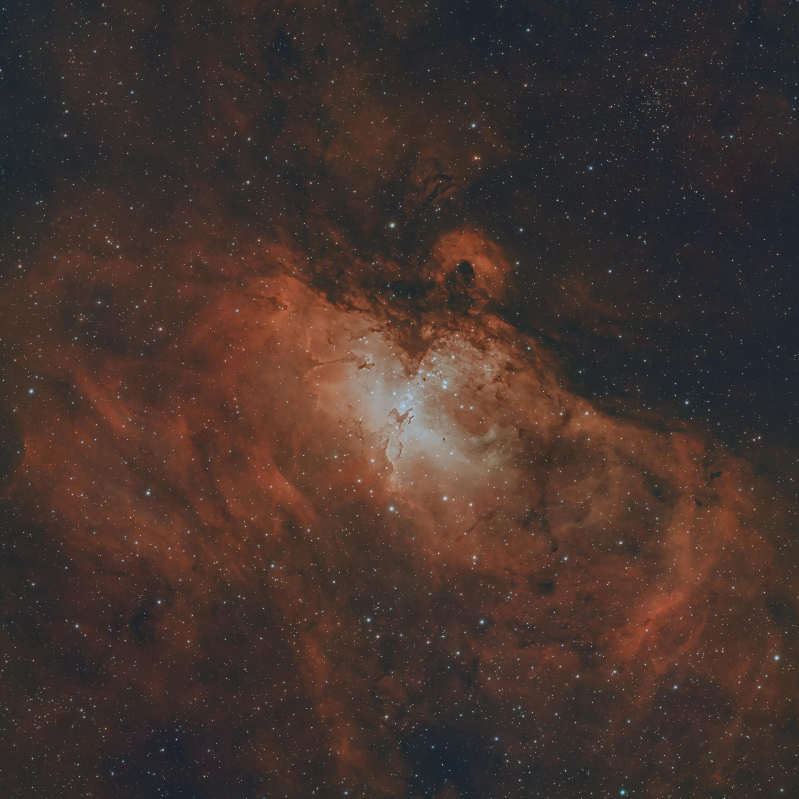 Breathtaking cosmic view of the Eagle Nebula with stars and interstellar clouds visible.